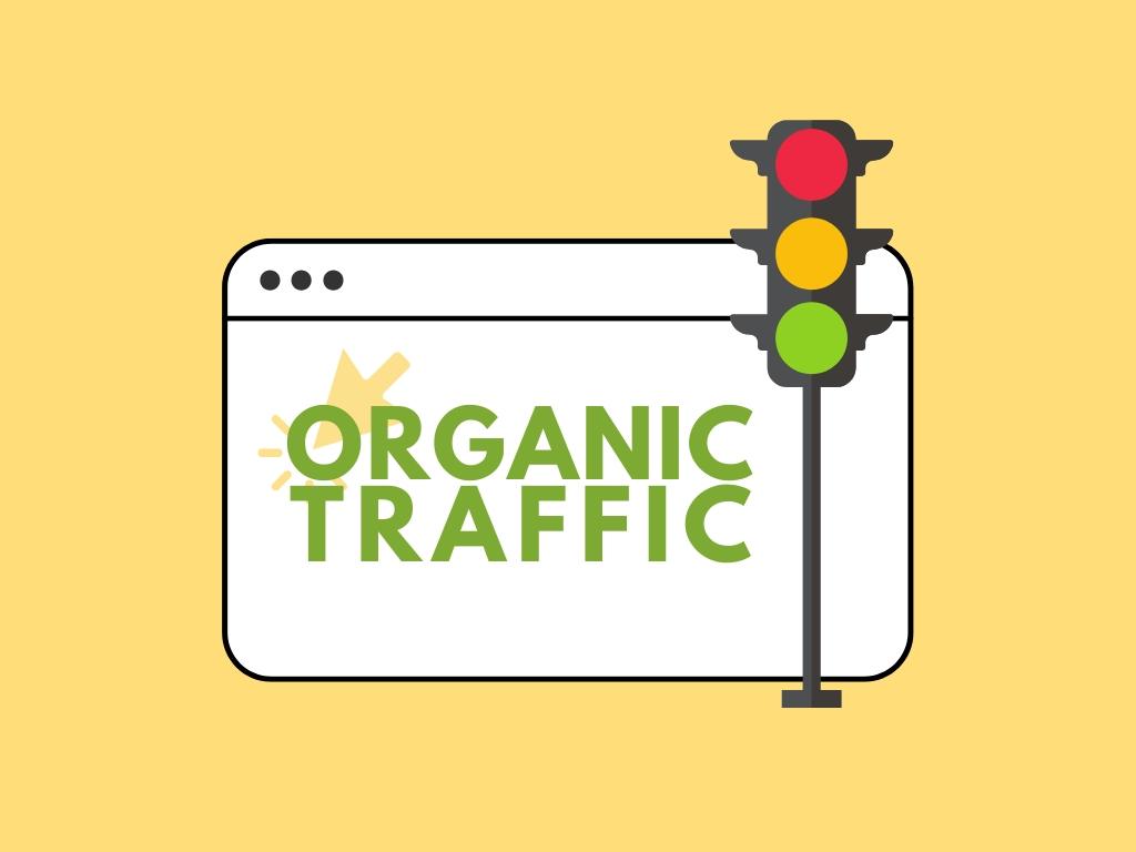 Web browser graphic with 'Organic Traffic' text and a green traffic light on a yellow background